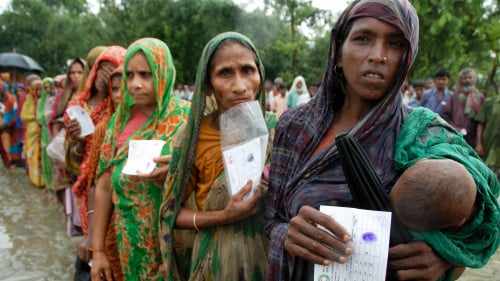 Women waiting in a line.